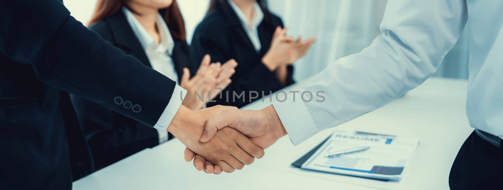 Business people group handshake at meeting table. Job interview success or making successful business oratory agreement