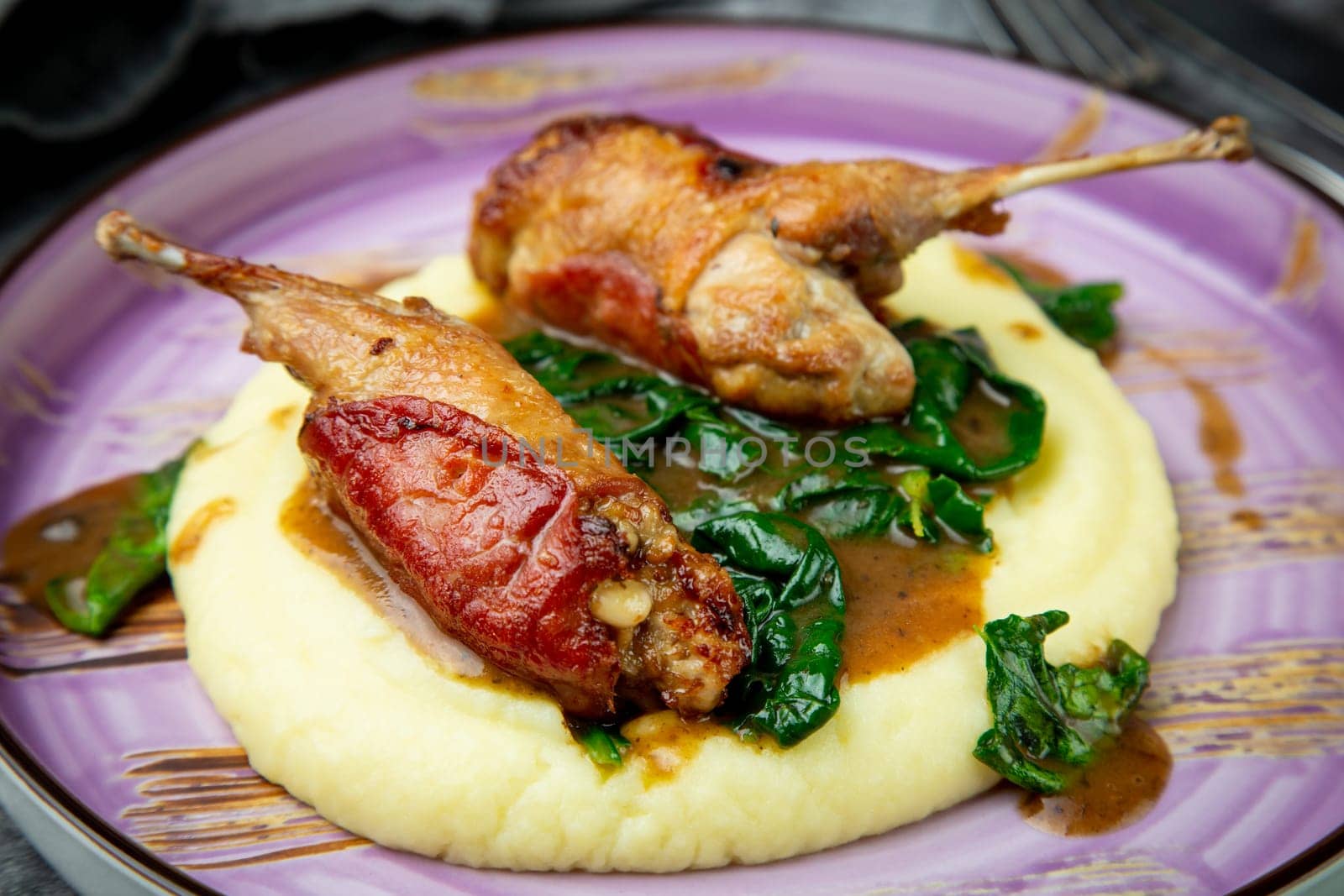 baked chicken wings with gravy, spinach and mashed potatoes top view by tewolf