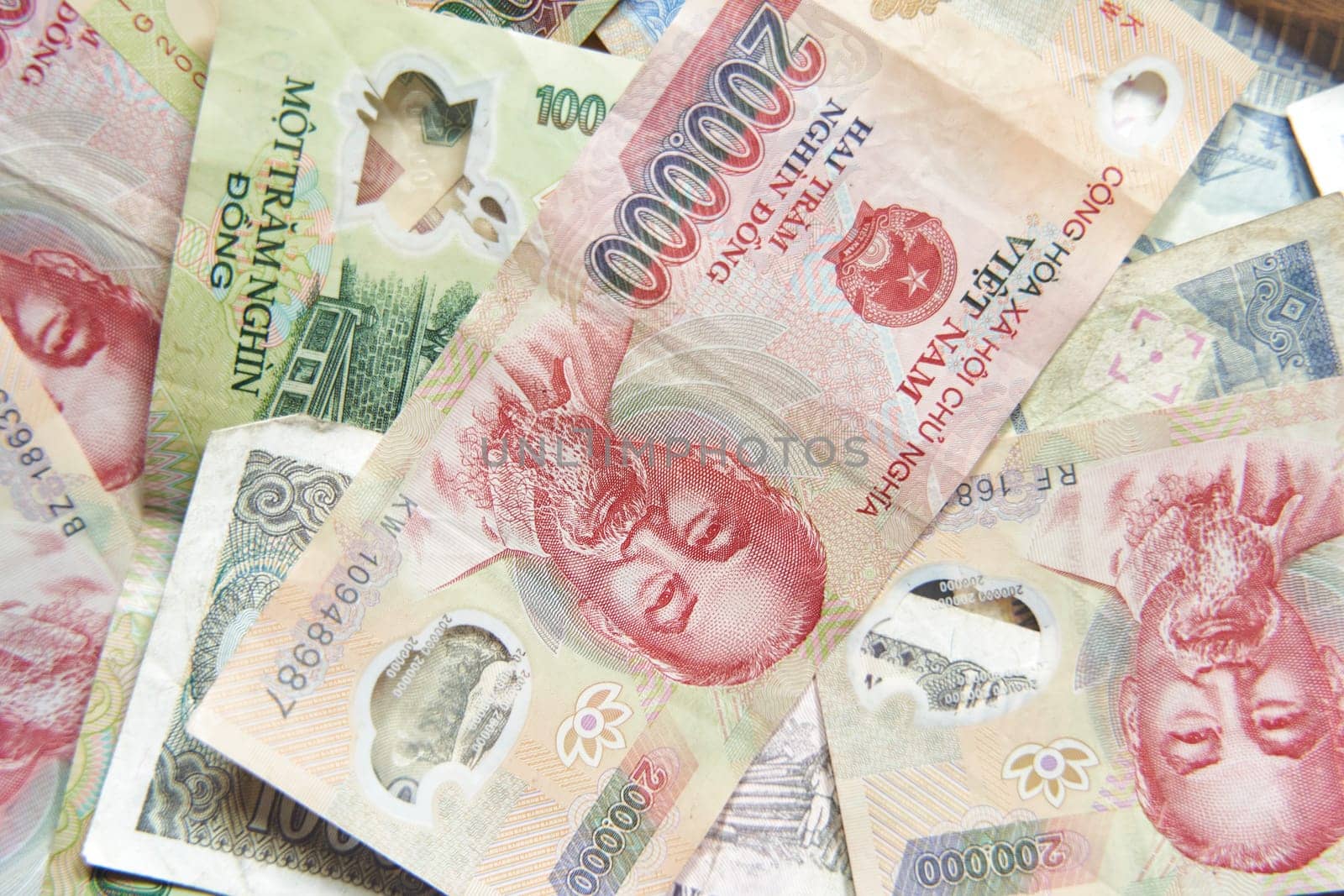 Vietnamese dong banknotes close-up. Money background. Vietnamese currency - dongs. Pattern texture and background of Vietnam dong money.