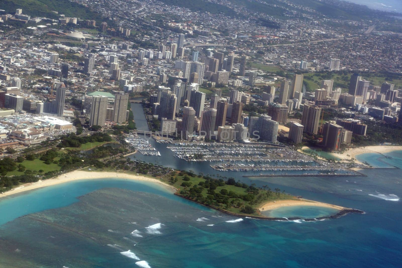 Aerial View of Honolulu Coastline and City by EricGBVD