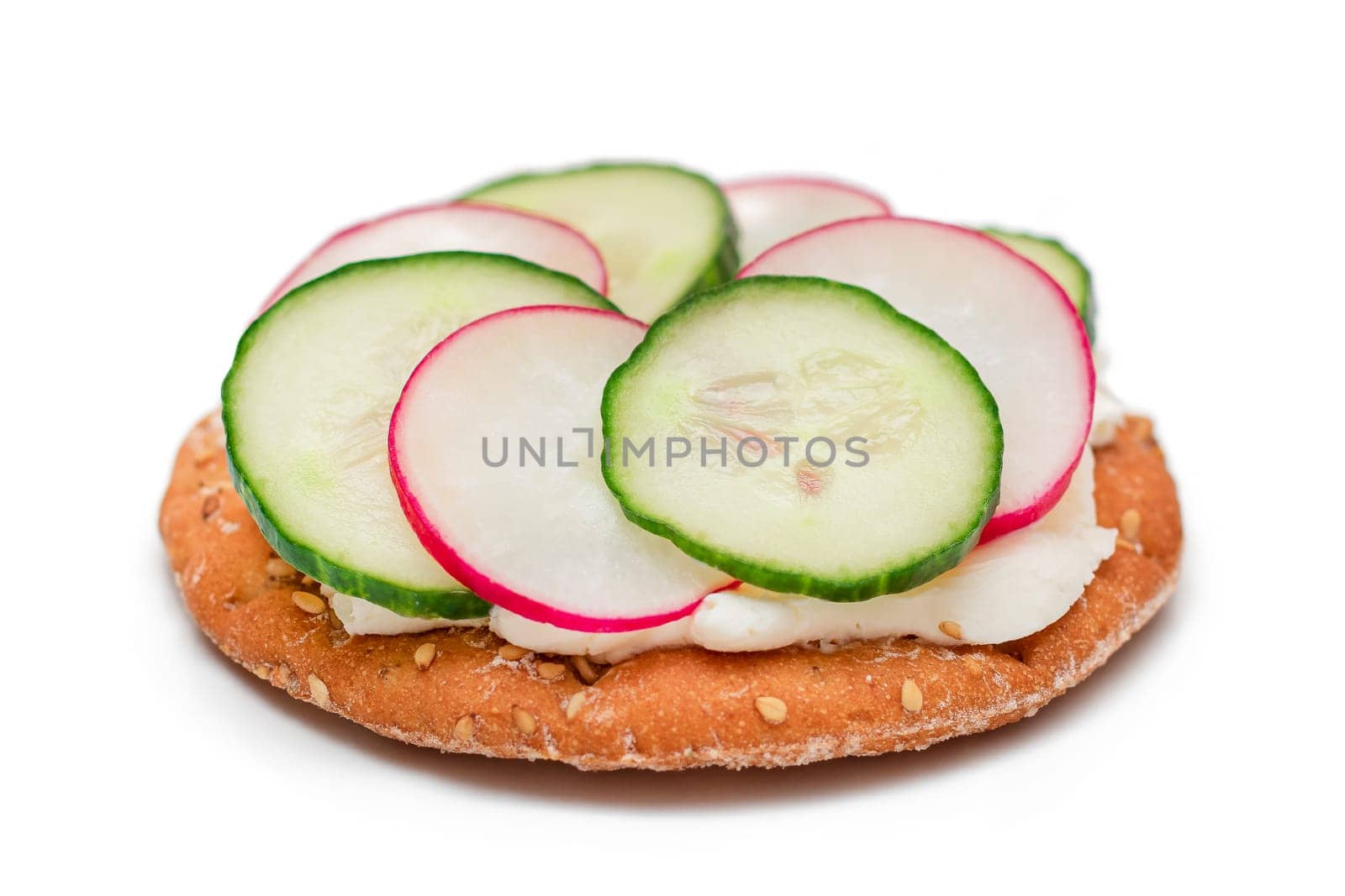 Crispy Cracker Sandwich with Cream Cheese, Fresh Cucumber and Radish - Isolated on White