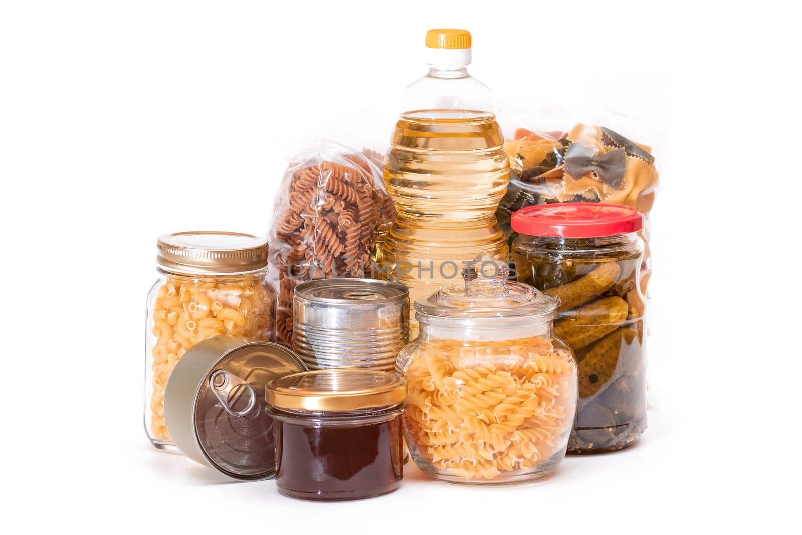 Food Reserves: Canned Food, Spaghetti, Pate, Tuna, Tomato Juice, Pasta, Fish and Grocery - Isolated on White Background. Emergency Food Storage in Case of Crisis. Strategic Food Supplies - Isolation