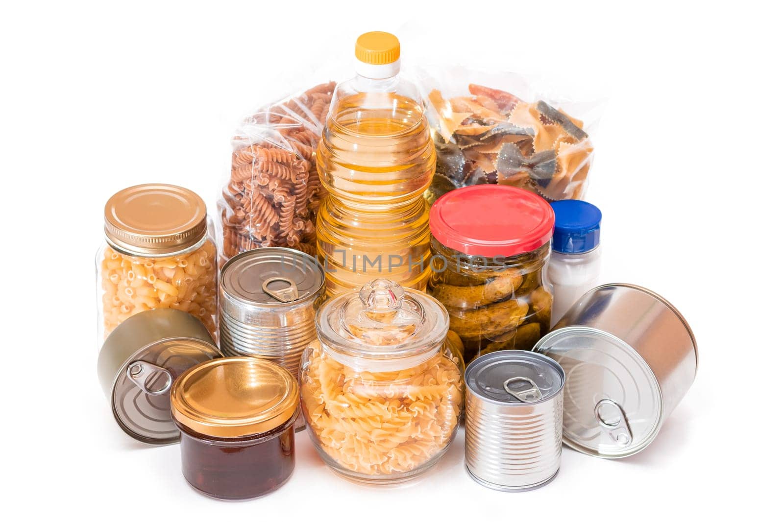 Food Reserves: Canned Food, Spaghetti, Pate, Tuna, Tomato Juice, Pasta, Fish and Grocery - Isolated on White Background. Emergency Food Storage in Case of Crisis. Strategic Food Supplies - Isolation