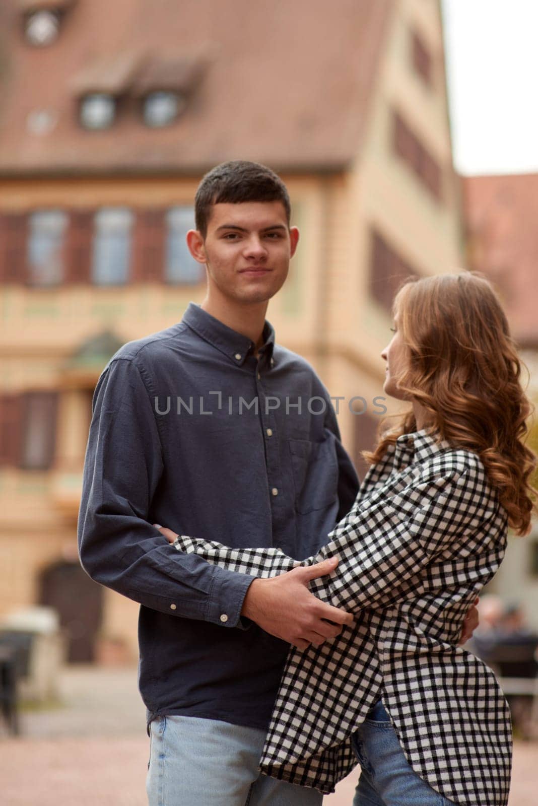 Young Cute Female Hugs Boyfriend. In Autumn Outdoor. Lovers Walking in Park. Attractive Funny Couple. Lovestory in Forest. Man and Woman. Cute Lovers in the Park. Family Concept. Happy Couple. by Andrii_Ko