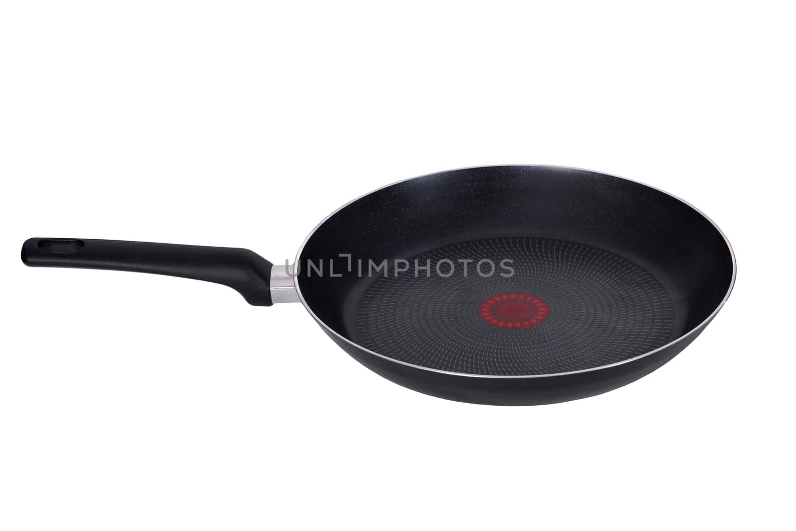 Black frying pan with nonstick surface isolated on white background, close up.