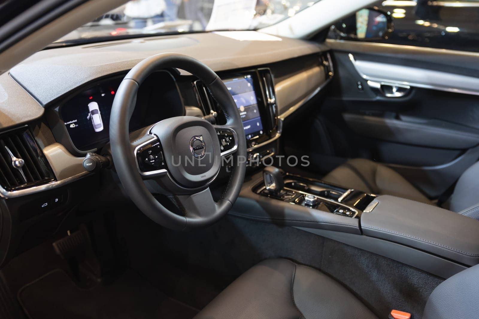 12 MAY 2023, Lisbon, Porugal, Electric car Show in International Fairy of Lisbon - The inside of a car with a steering wheel and dashboard