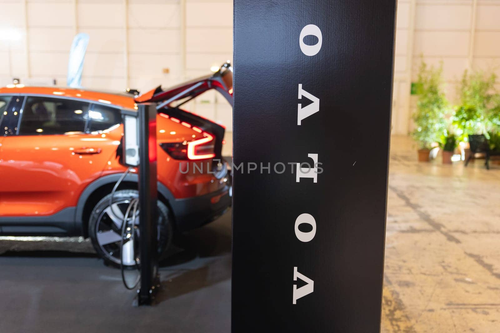 12 MAY 2023, lISBON, Porugal, Electric car Show in International Fairy of Lisbon - an Electric Orange Dream: The Sparkling Showcase of Futuristic Automotive Excellence by Studia72
