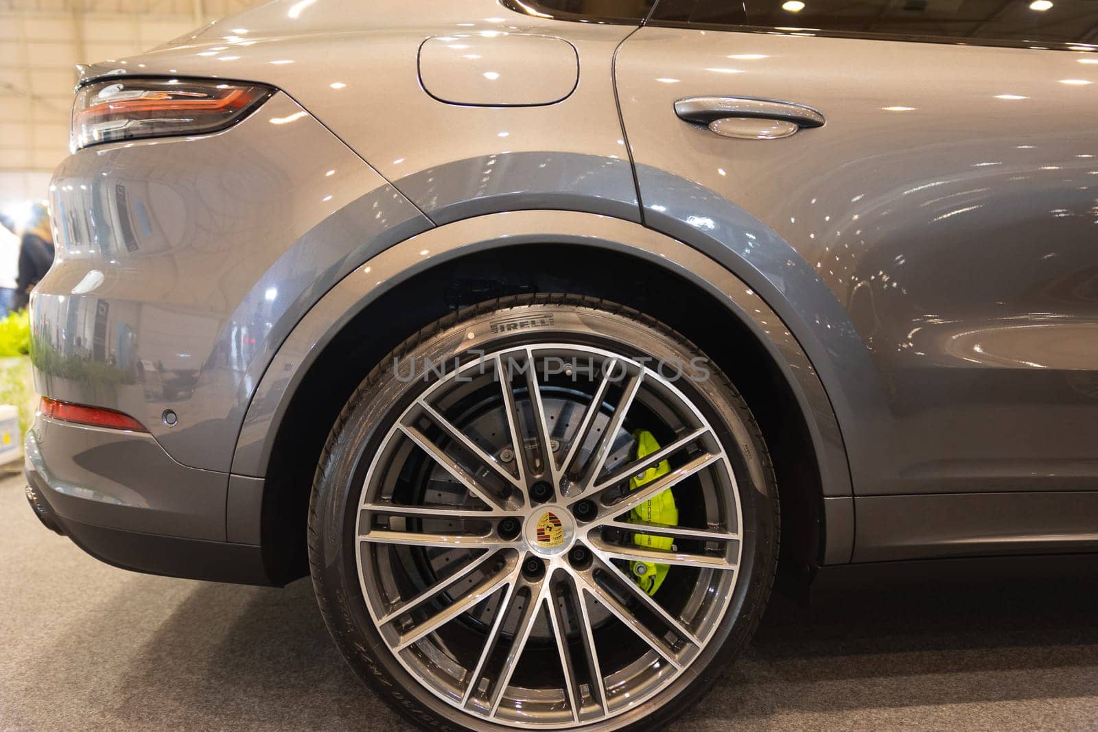 12 MAY 2023, Lisbon, Porugal, Electric car Show in International Fairy of Lisbon - A close up of a car on a showroom floor