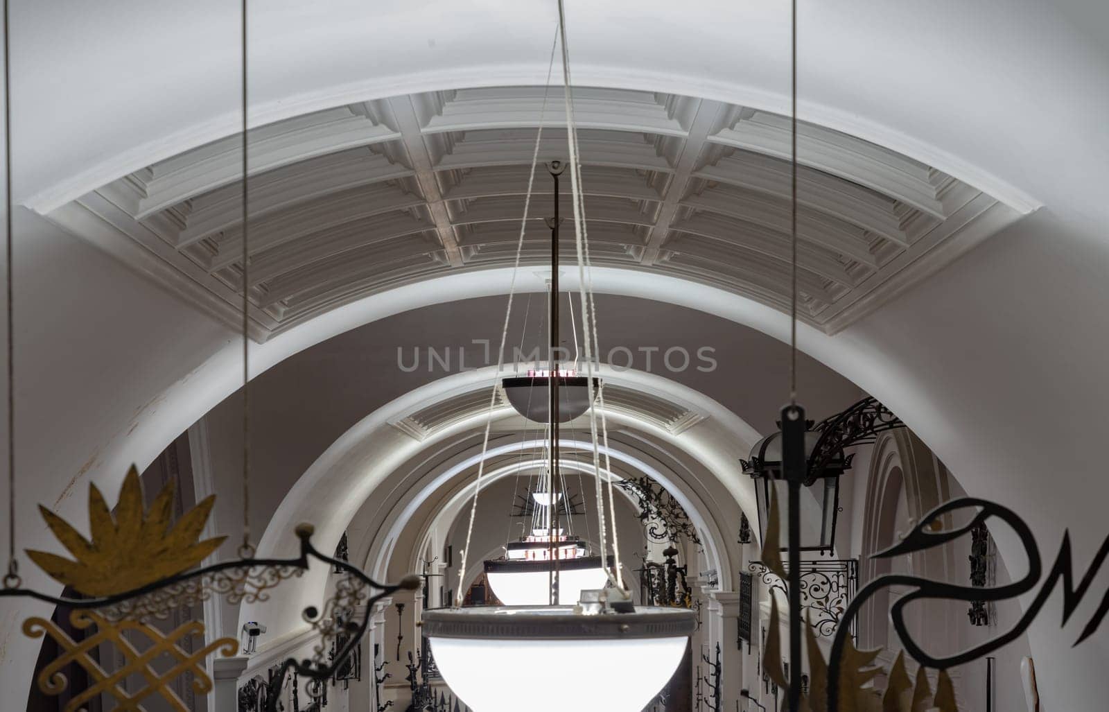 London, UK - Nov 27, 2023 - Perspective of interior architecture design lamps of The Victoria and Albert Museum. Inner decor, Space for text, Selective focus.