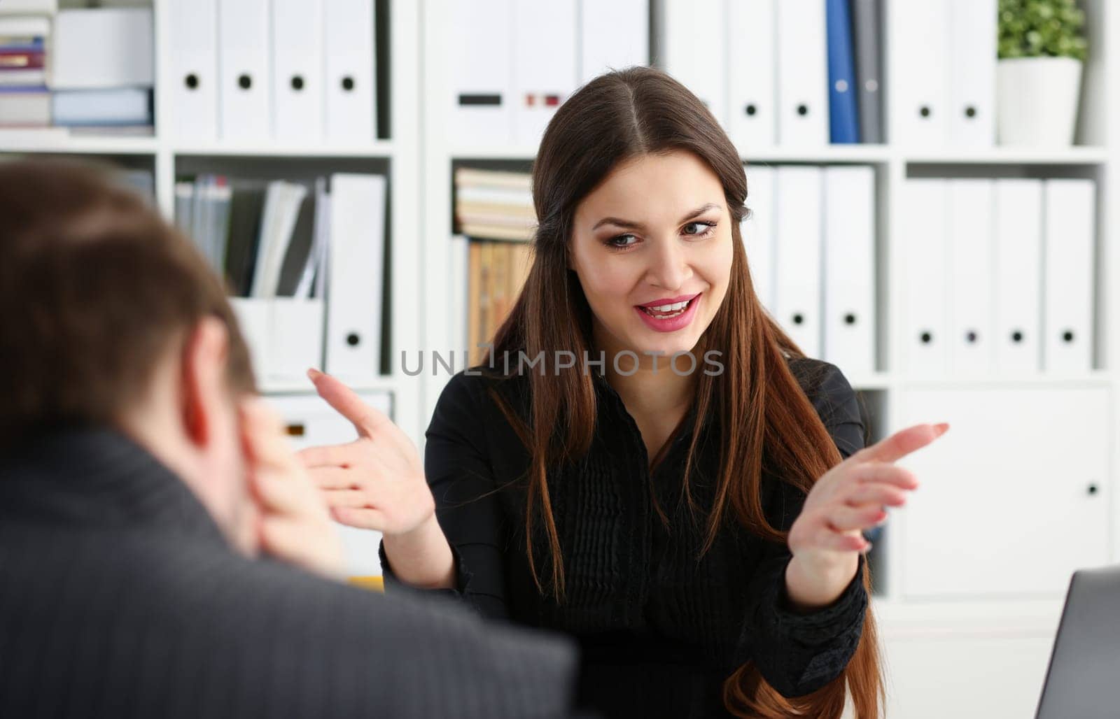 Man and smiling mature woman talking in office. Client or companion support white collar partner profit positive friendly summit clerk bargain or deal discussion concept