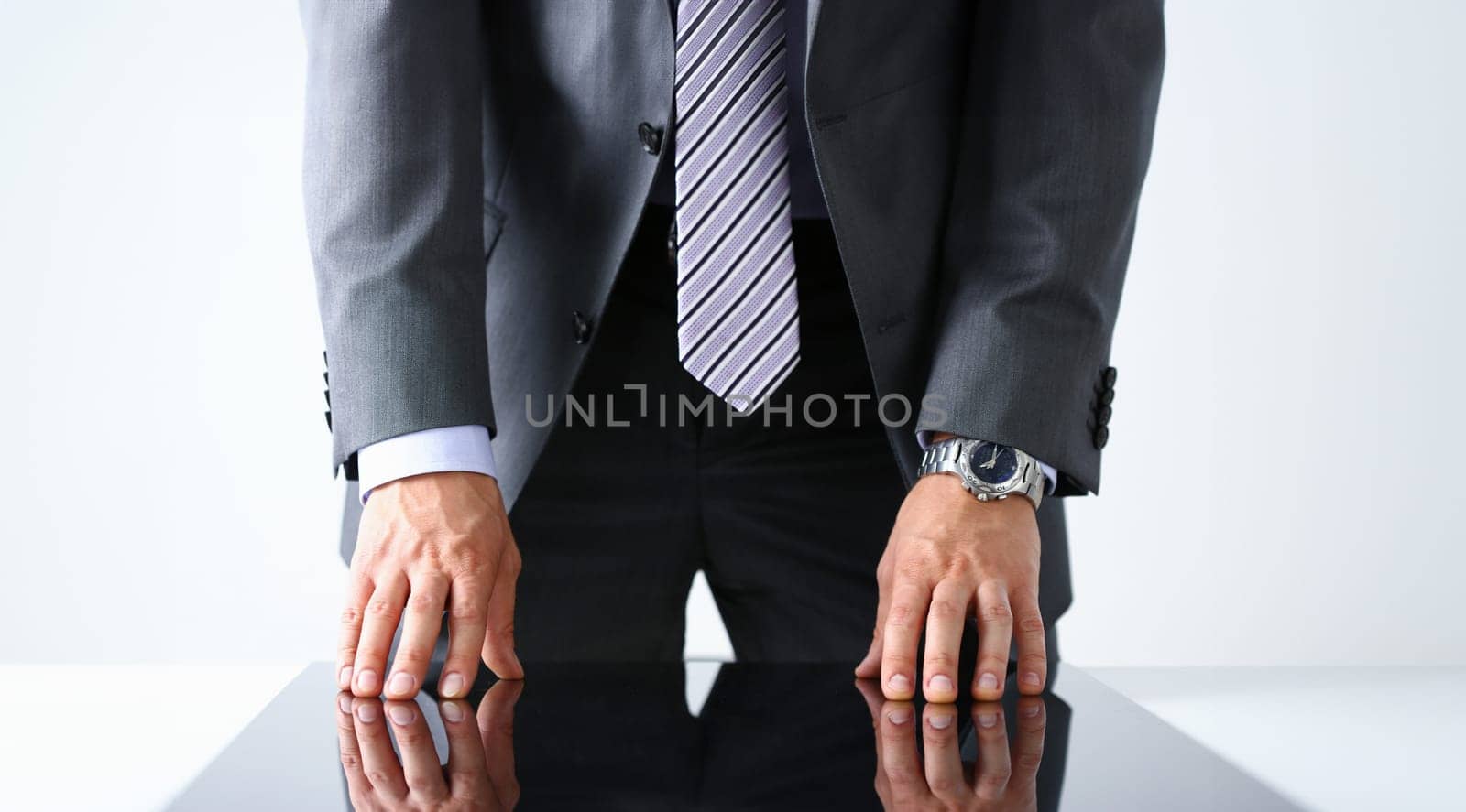 Empty arms of man in suit and tie closeup by kuprevich