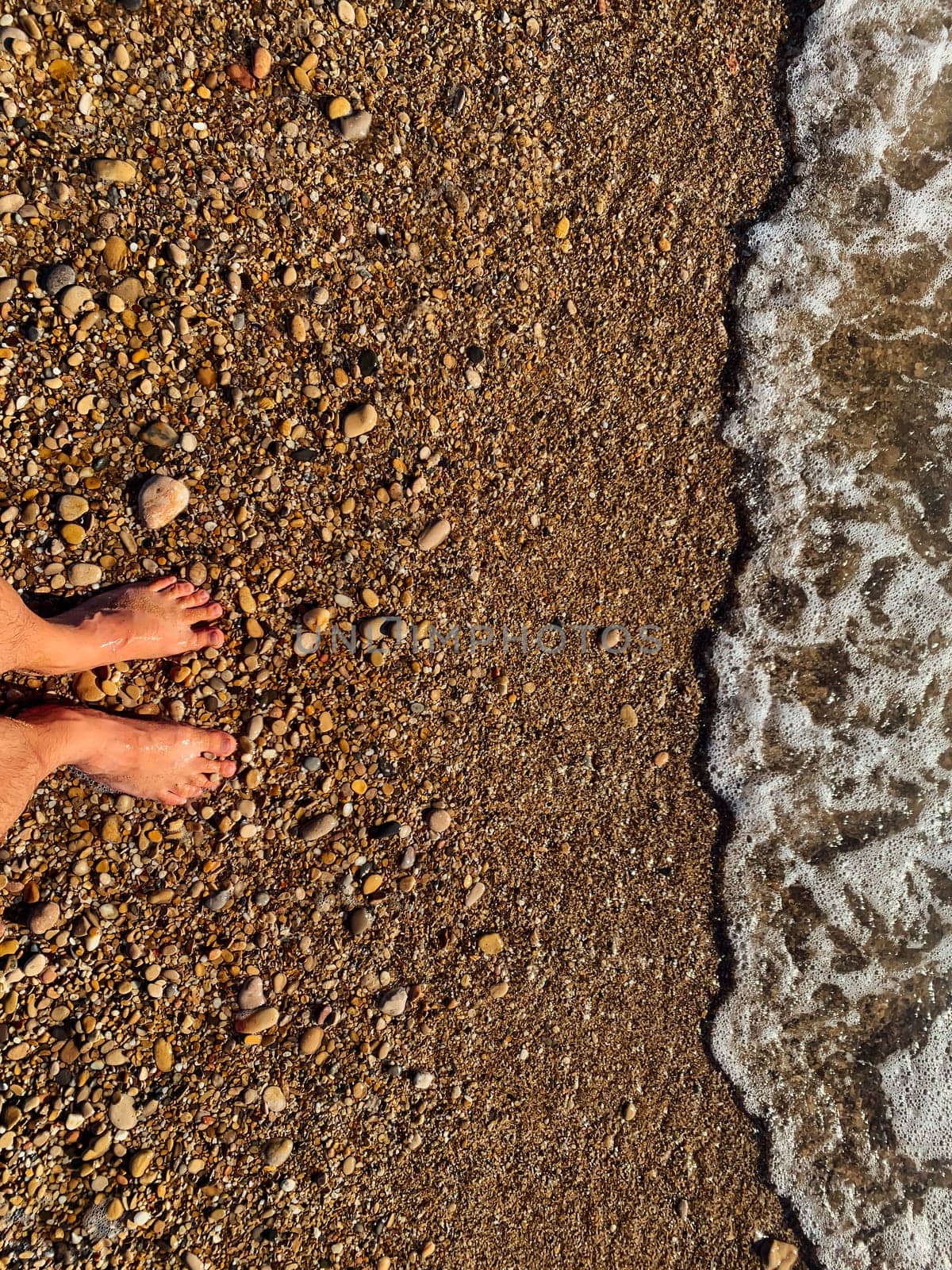 feet on the seashore beach summer vacation sea