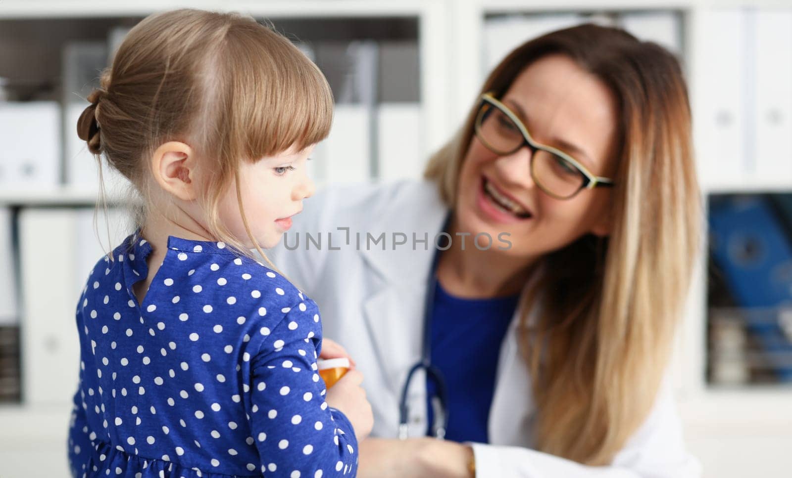 Little child with mother at pediatrician reception. Physical exam cute infant portrait baby aid healthy lifestyle ward round child sickness clinic test high quality and trust concept