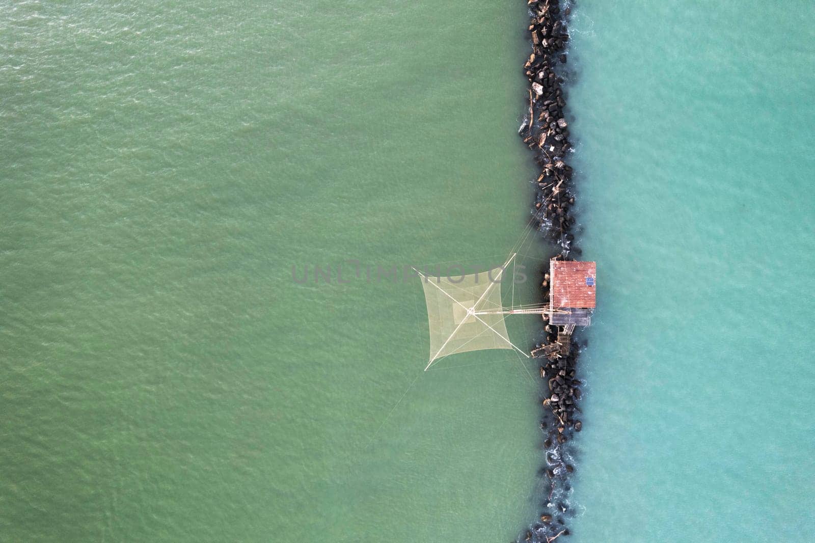 Aerial photographic documentation of the ancient fishing stations at the mouth of the Arno river Tuscany Italy 