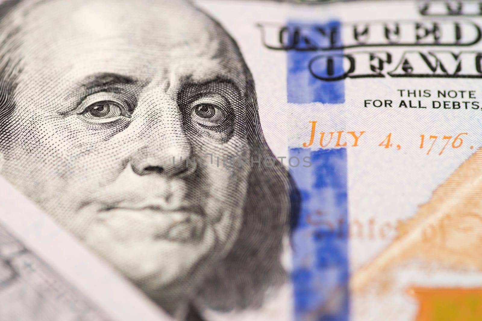 Portrait of Benjamin Franklin from 100 dollars bill. The face of Benjamin Franklin on the hundred dollar banknote, backgrounds, close-up.