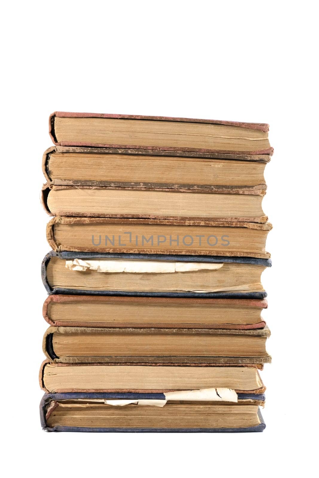 A stack of old books isolated on a white background.