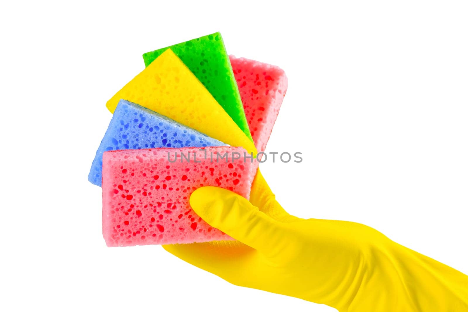 A hand in a yellow glove holds a set of sponges isolated on a white background. Washing dishes, cleaning, home cleaning.