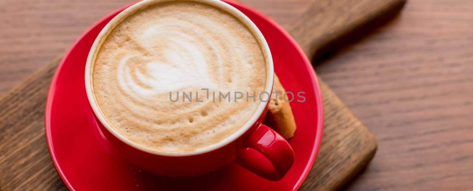 Latte Art, coffee isolated on wooden background