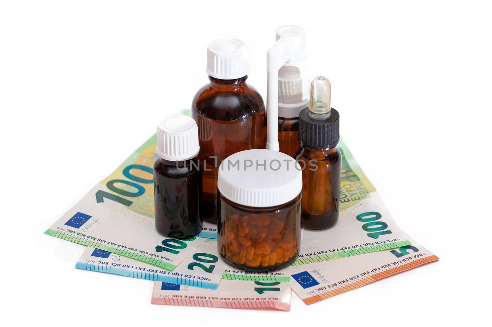 Different Bottles with Pills, Capsules and Medicines on the Euro Banknotes by InfinitumProdux