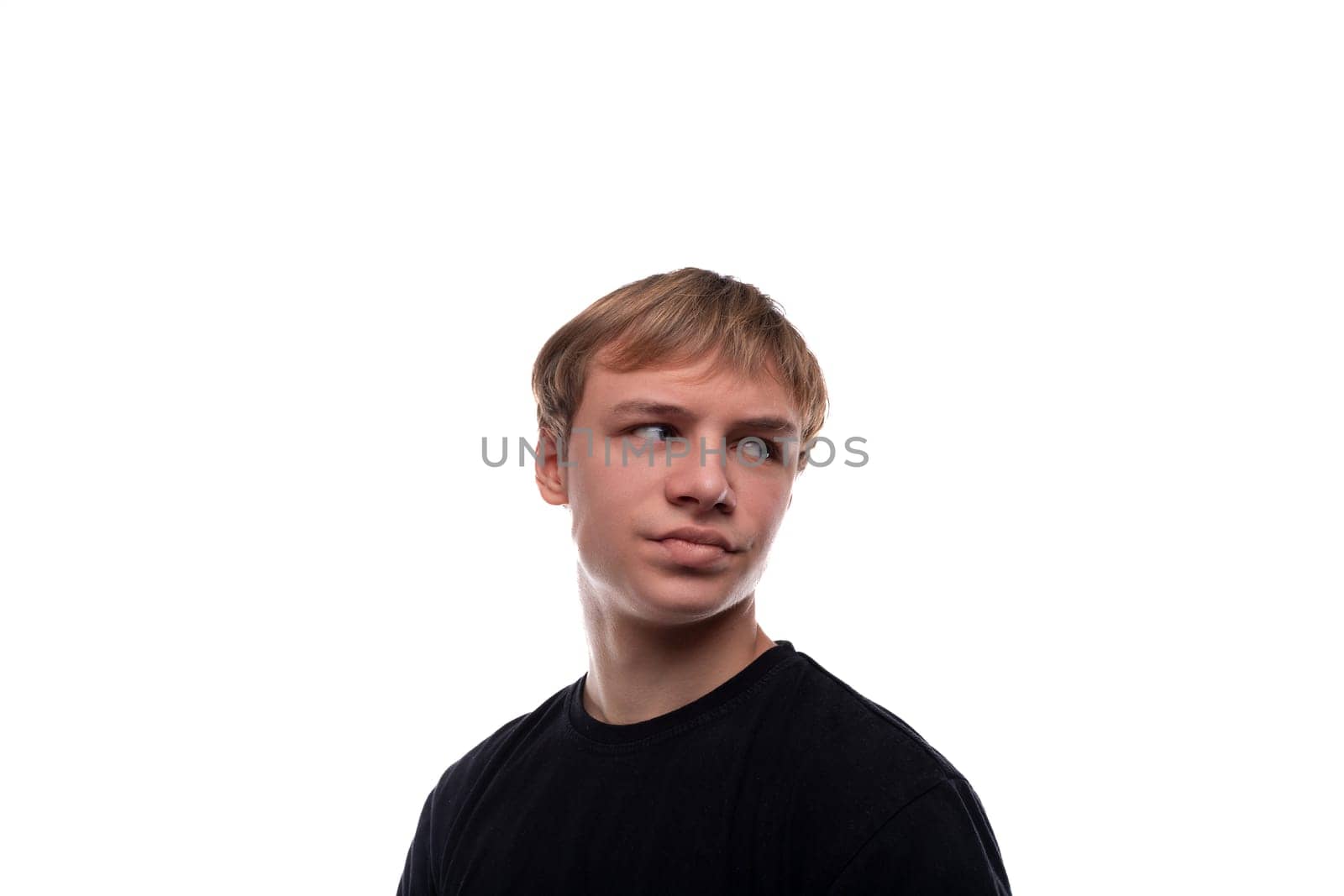 Blonde teenager wearing a basic t-shirt on a white background.