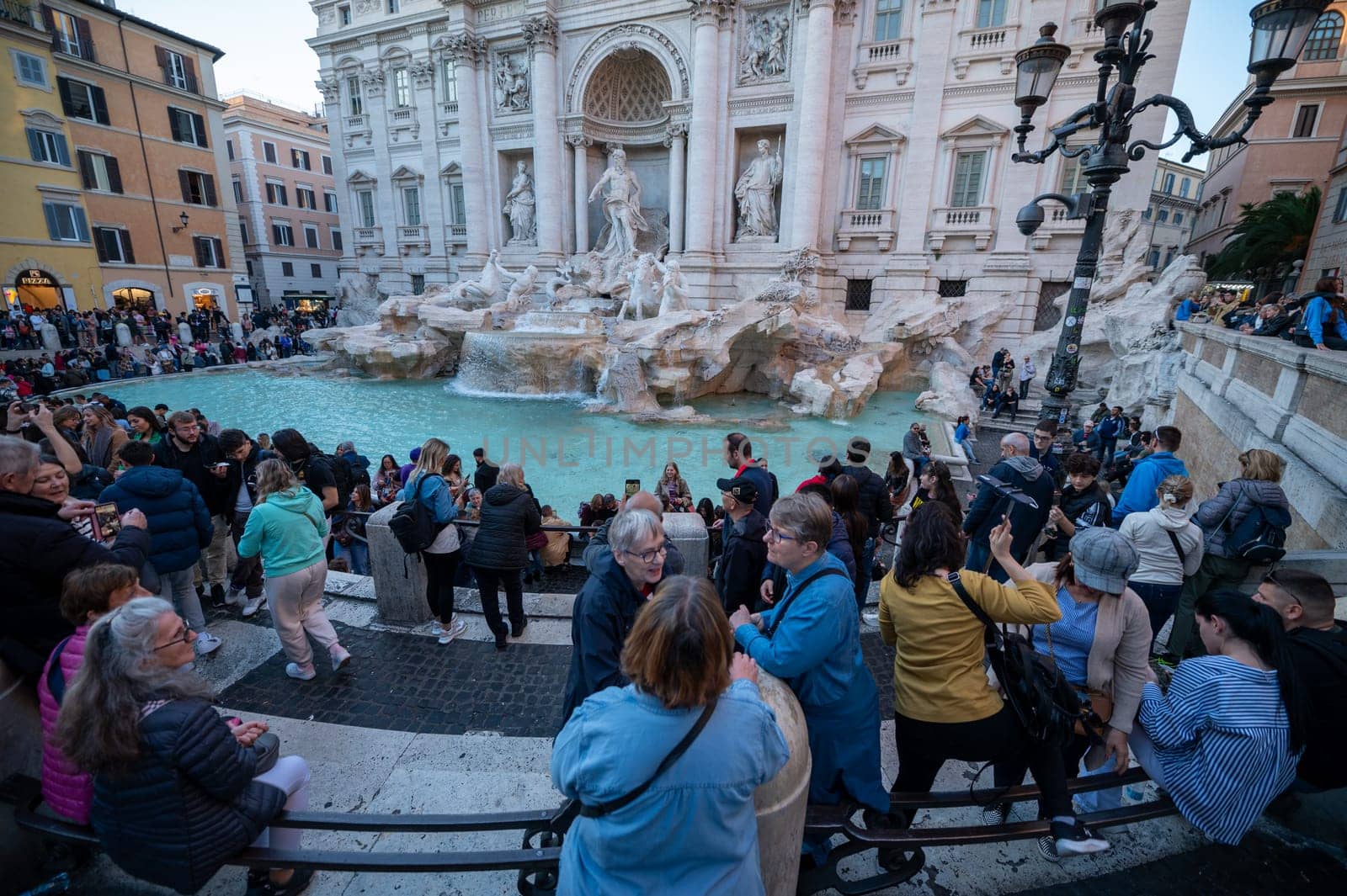 Rome, Italy: 2023 November 14: Tourists at the Trevi Fountain, the historic center of the city of Rome in Italy in 2023.