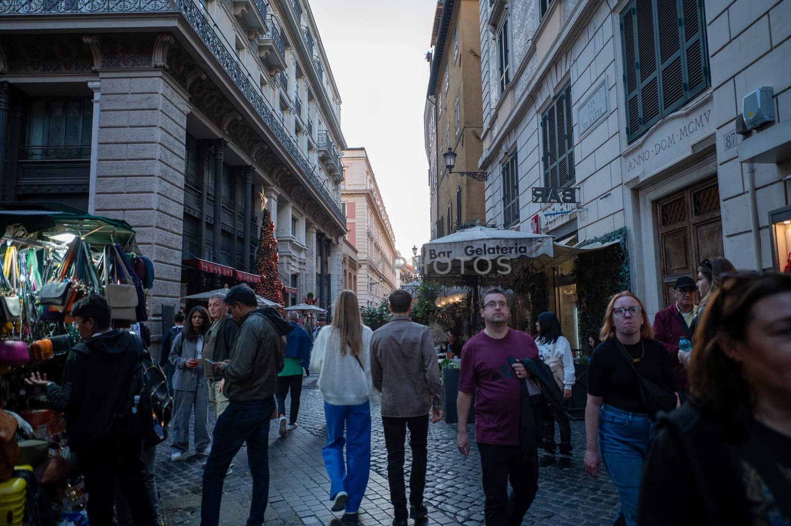 Rome, Italy: 2023 November 14: Tourists walking through the historic center of the city of Rome in Italy in 2023.