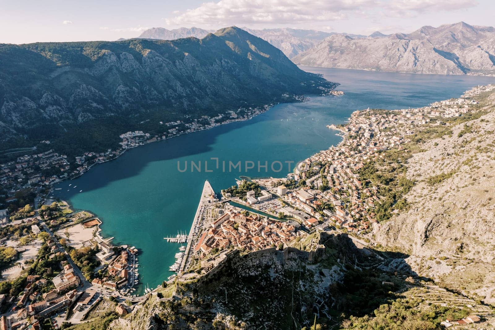 View from the mountain to the bay and the ancient town on the shore. Kotor, Montenegro. High quality photo