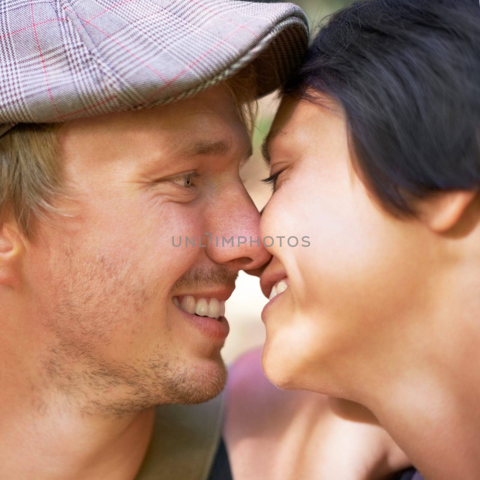 Nose touch, love and happy couple together outdoor, healthy relationship and connection in summer. Man, woman and romantic people bonding, support or trust, face profile or relax on date in affection by YuriArcurs