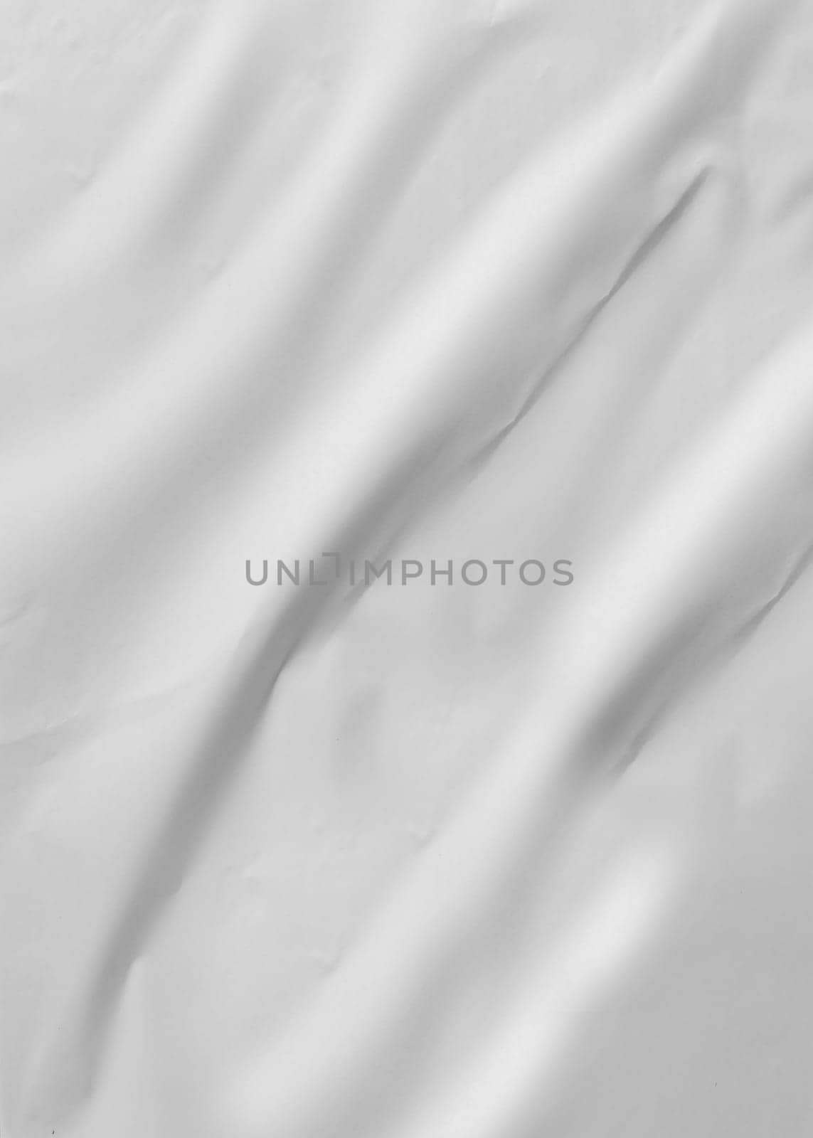 Crumpled thin gray paper background texture