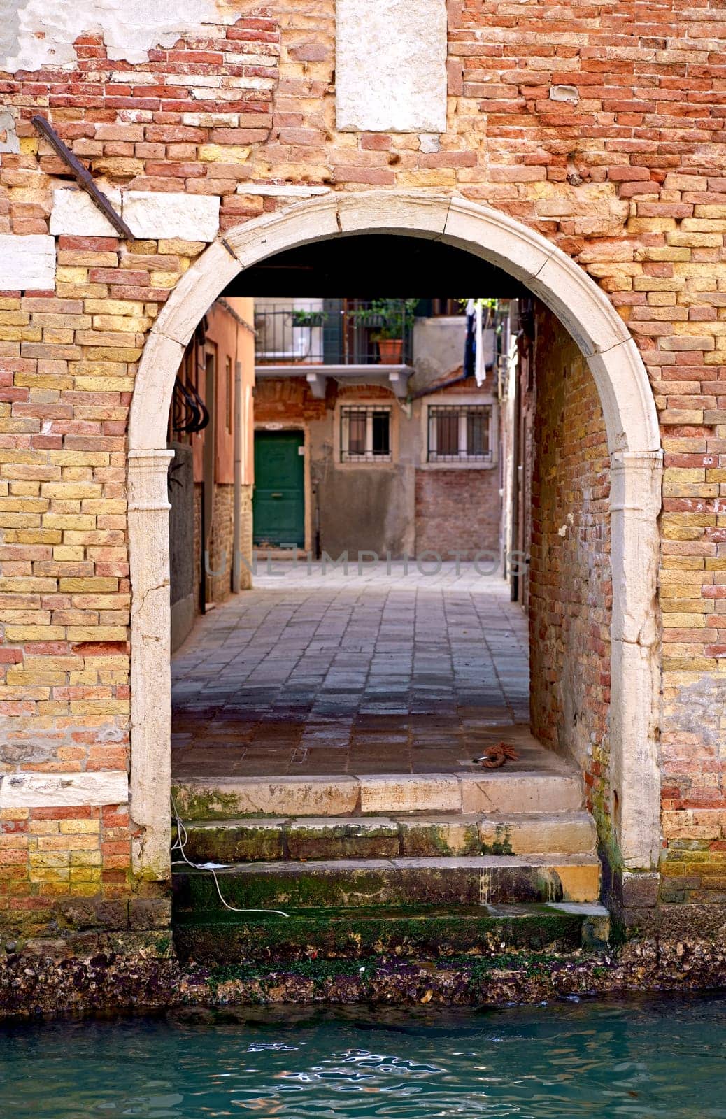 Doors in Venice. Architecture. Wooden door and window, building exterior in Venice, exterior design