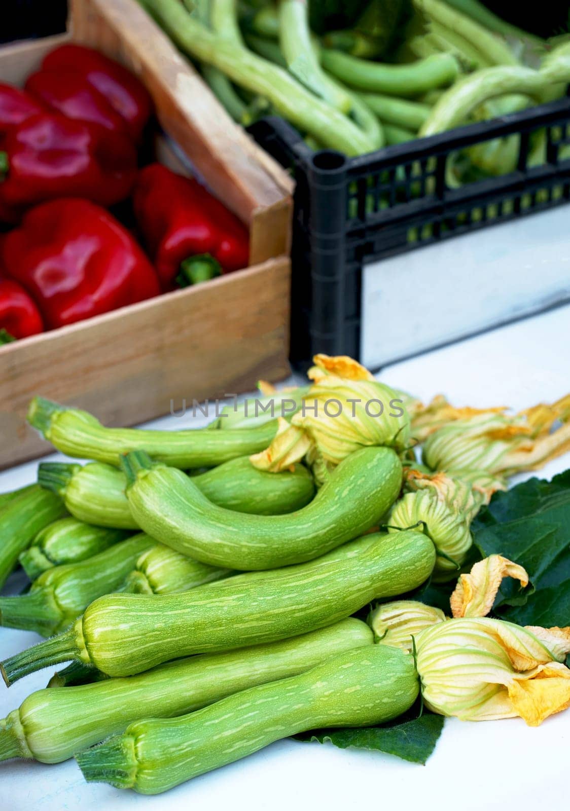 Nice. French market. Fresh zucchini with flowers sold at the market