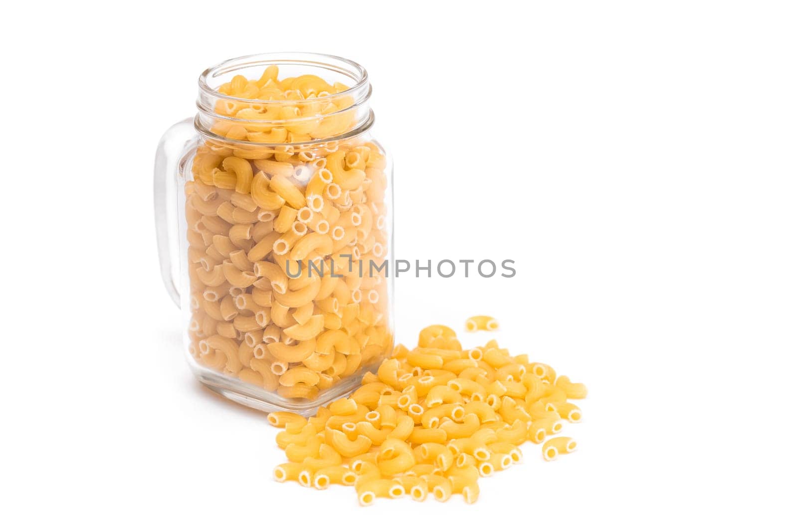 Uncooked Chifferi Rigati Pasta in Glass Jar Isolated on White by InfinitumProdux