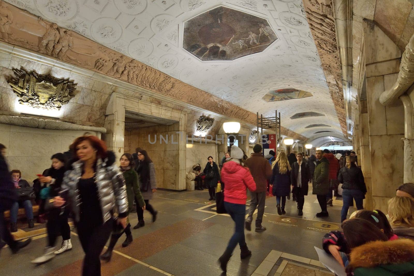 Moscow, Russia - FEB 20. 2020. Many passengers at Novokuznetskaya metro station by olgavolodina