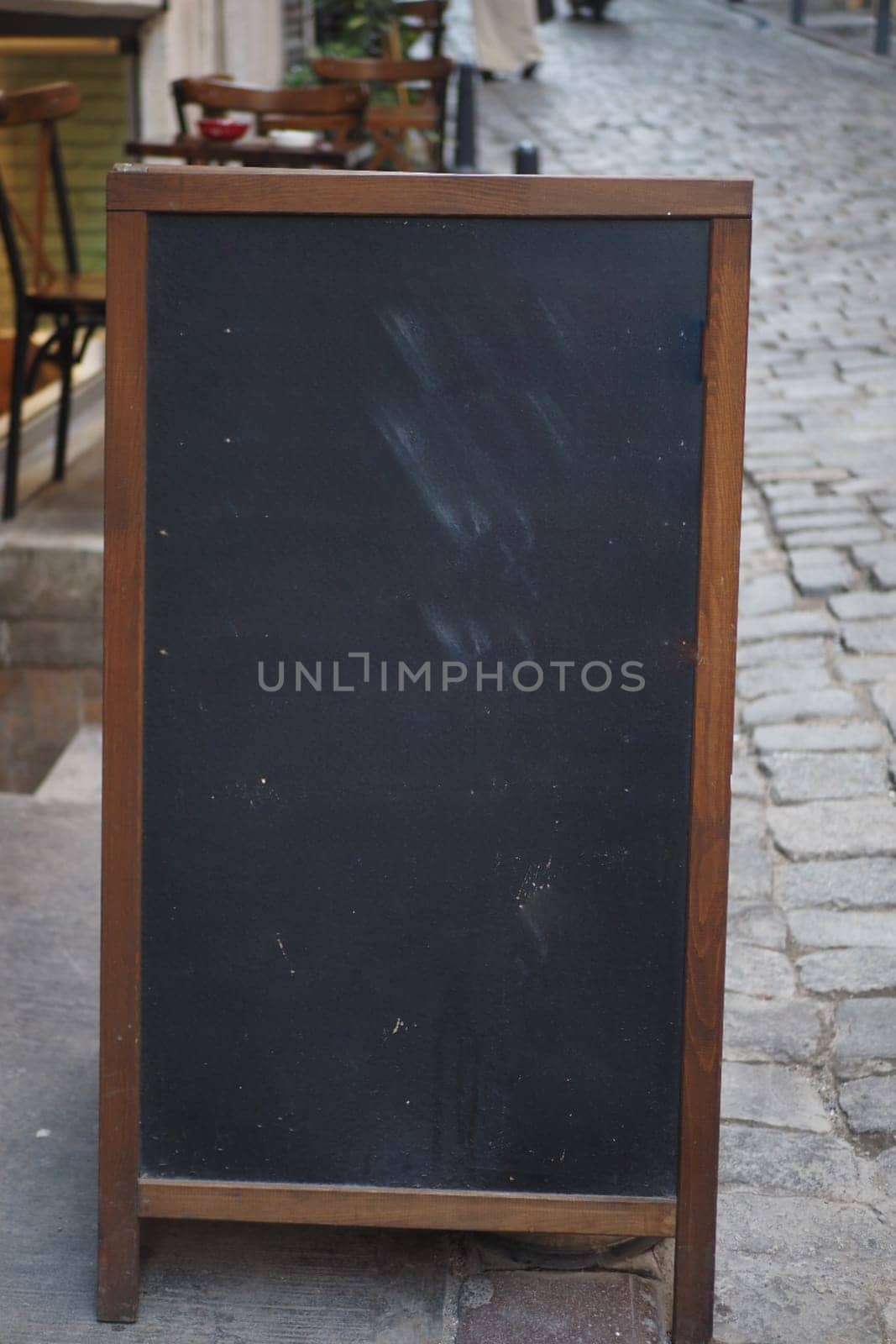 Cafe menu on black board outdoor .