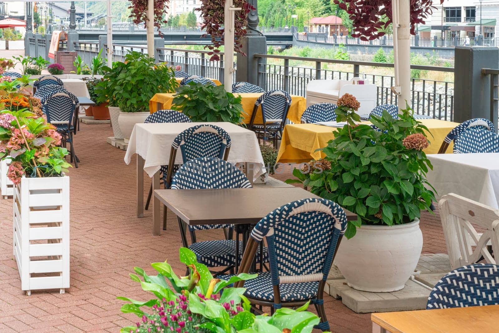 empty cafe tables close-up as a background by roman112007