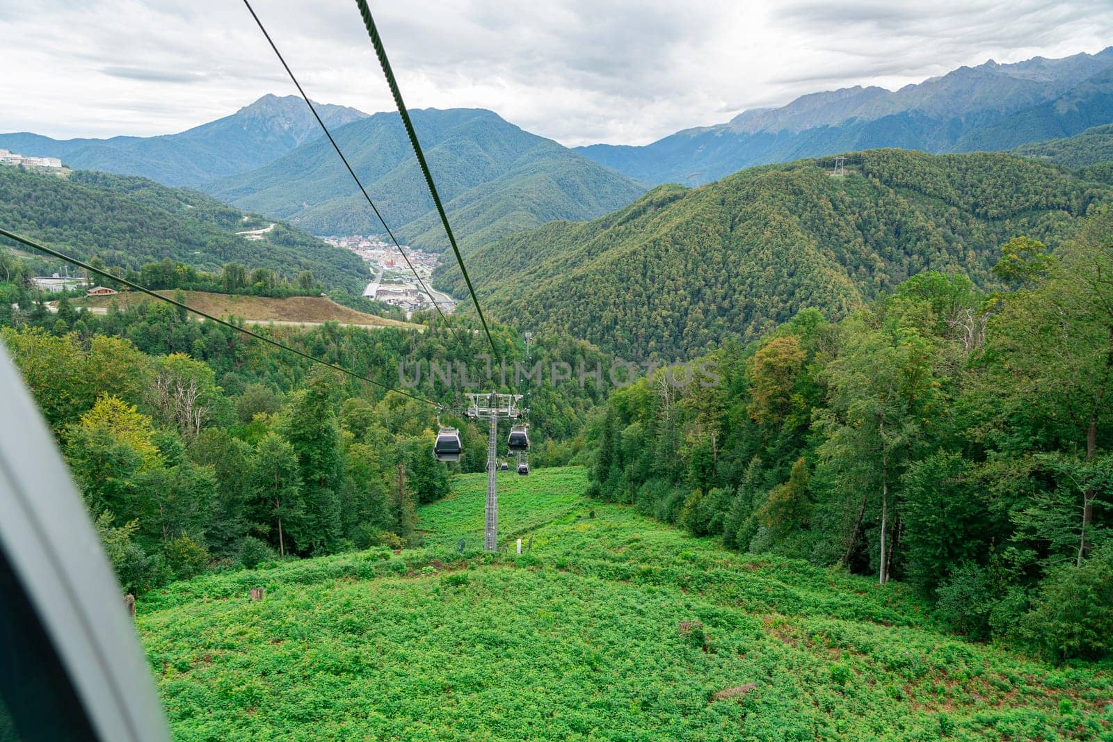 lifts of the mountain cable car on the background of mountains by roman112007