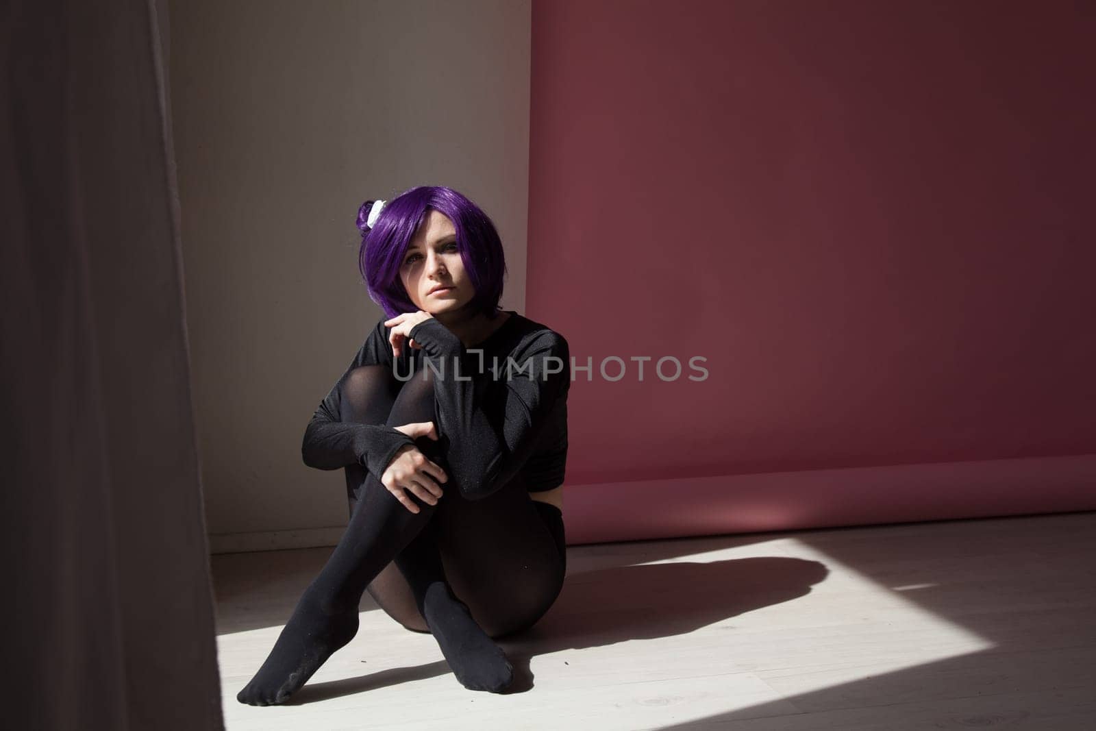 Woman anime cosplayer with purple hair Japan