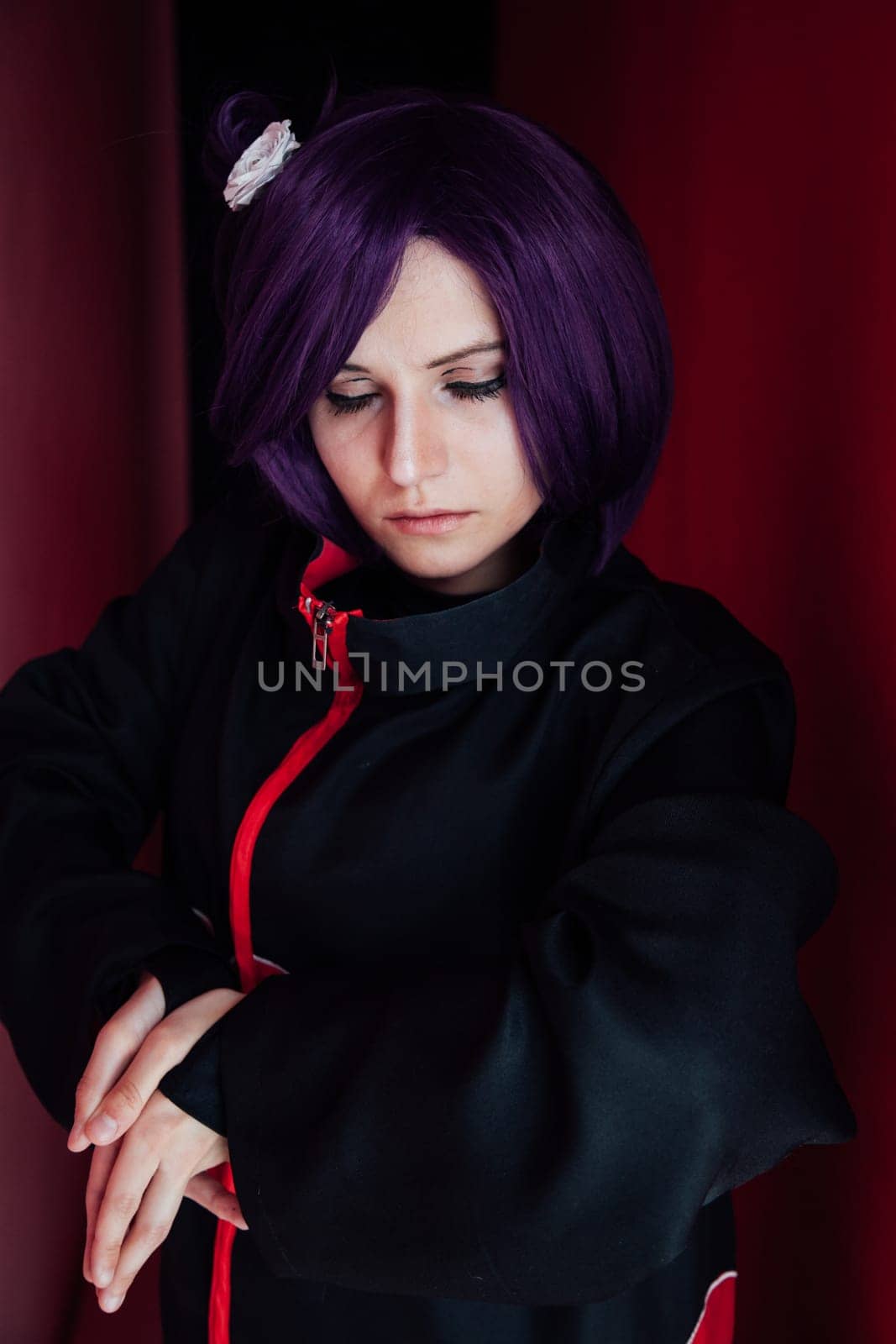 woman anime cosplayer with purple hair