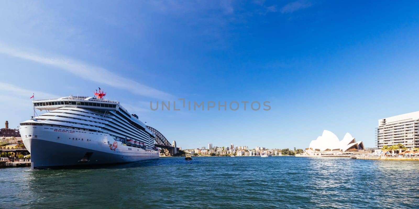 SYDNEY, AUSTRALIA - DECEMBER 05: Virgin Voyages' Resilient Lady is berthed at the Overseas Passenger Terminal in Circular Quay on December 5th 2023