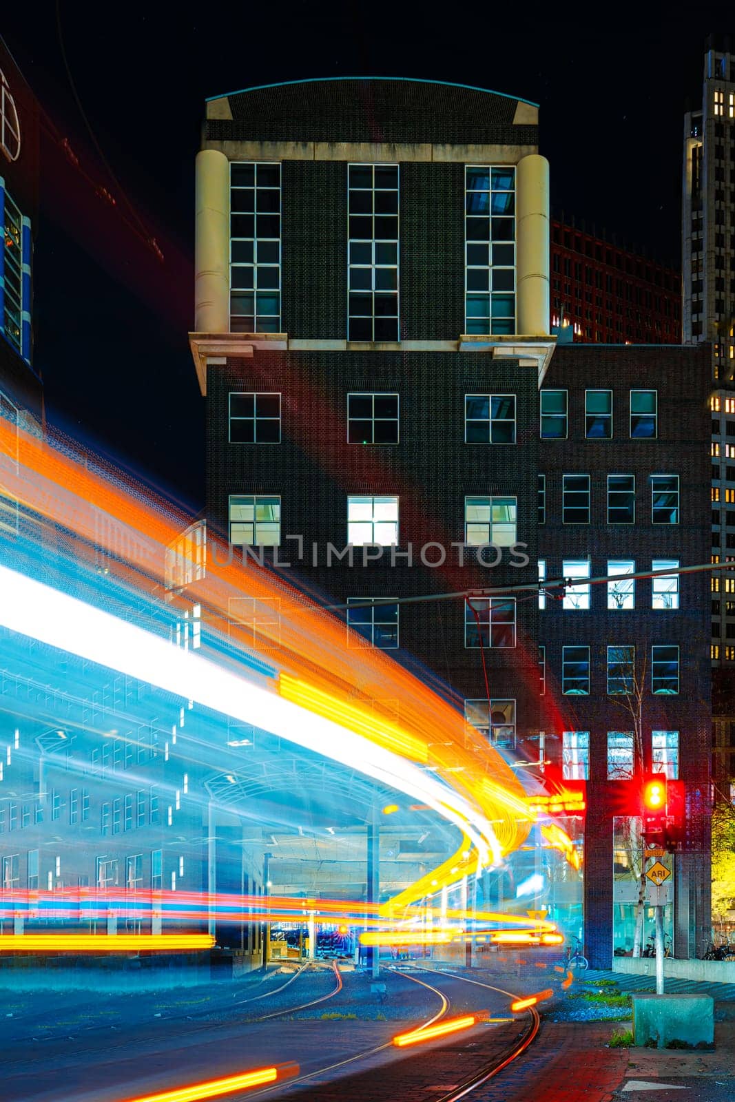 Starry night over The Hague, Netherlands city illuminated by city lights by PhotoTime