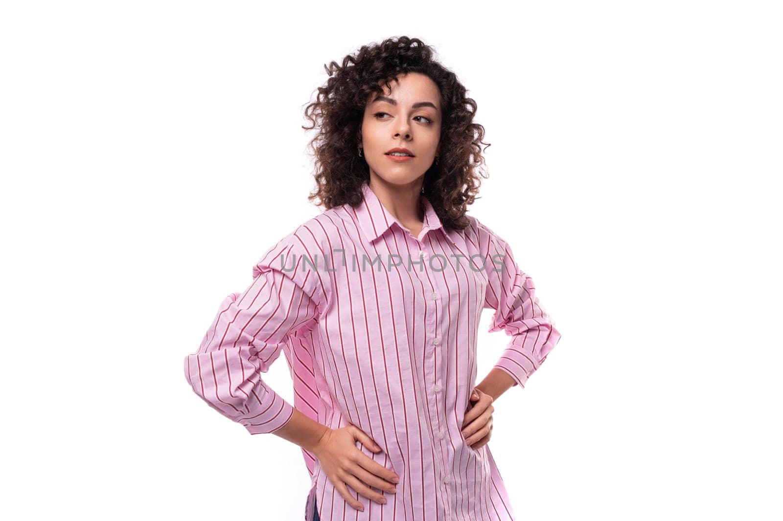 portrait of a young office secretary woman dressed in a striped pink shirt on a white background.