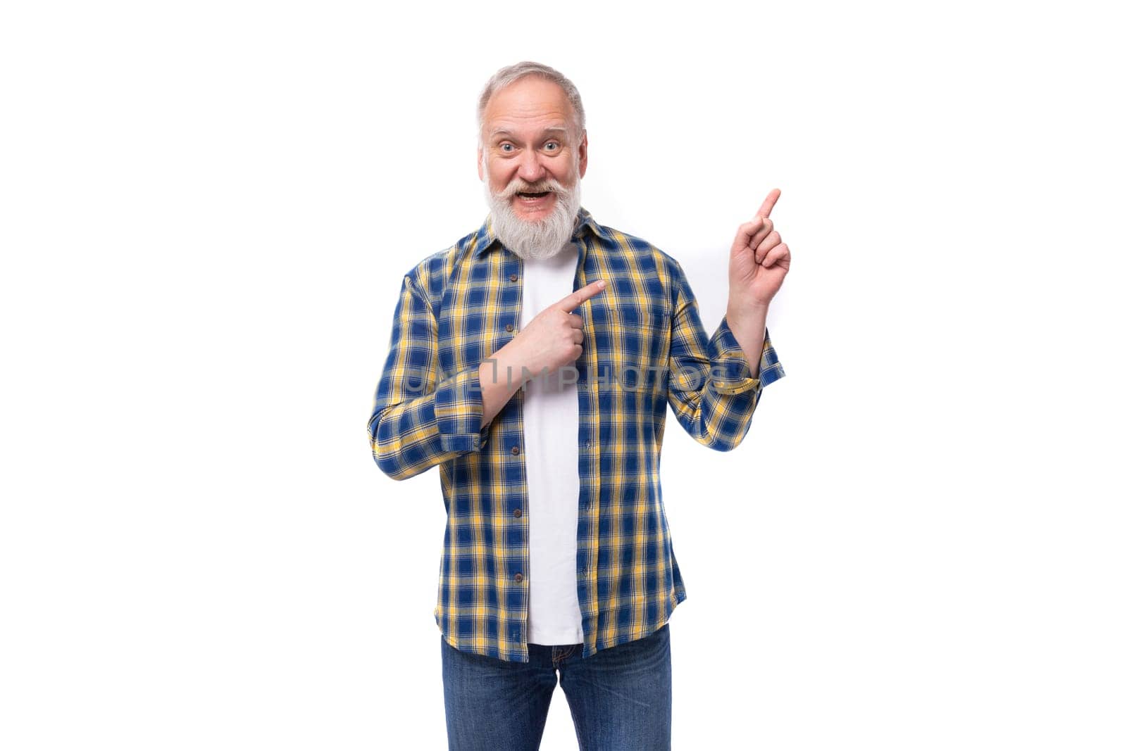 well-groomed 50s mid-aged gray-haired retired man with mustache and beard shows his hand to the side on a white background by TRMK