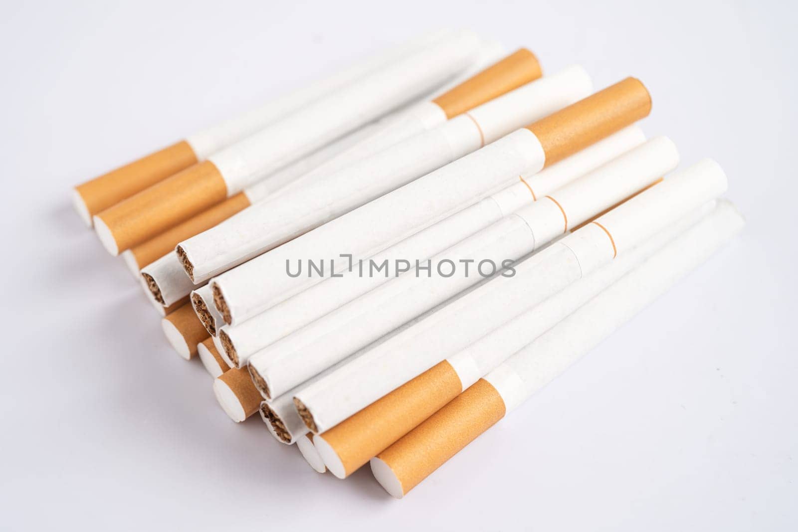 Cigarette, tobacco in roll paper with filter tube, No smoking concept. by pamai