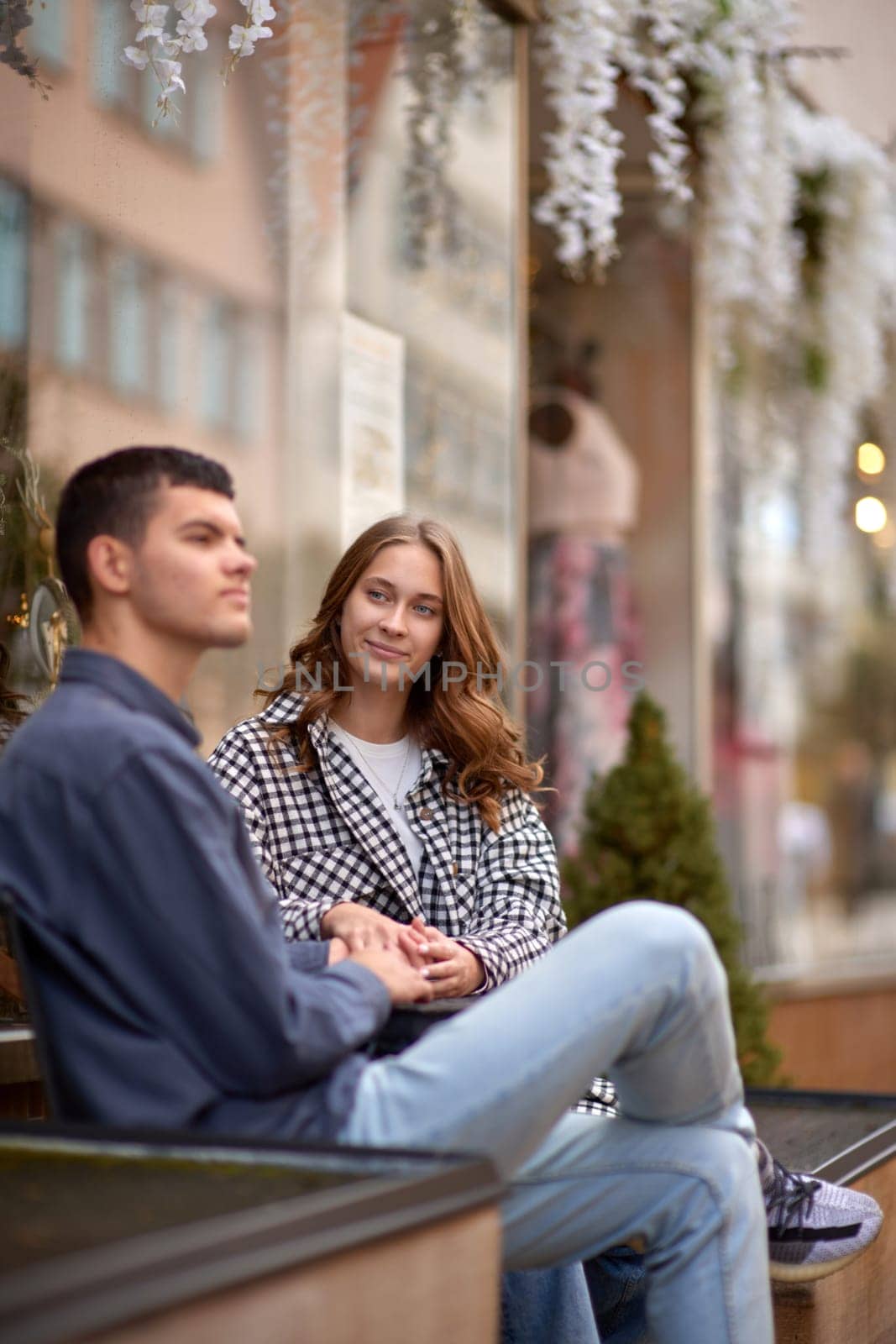 Young Cute Female Hugs Boyfriend. In Autumn Outdoor. Lovers Walking in Park. Attractive Funny Couple. Lovestory in Forest. Man and Woman. Cute Lovers in the Park. Family Concept. Happy Couple.