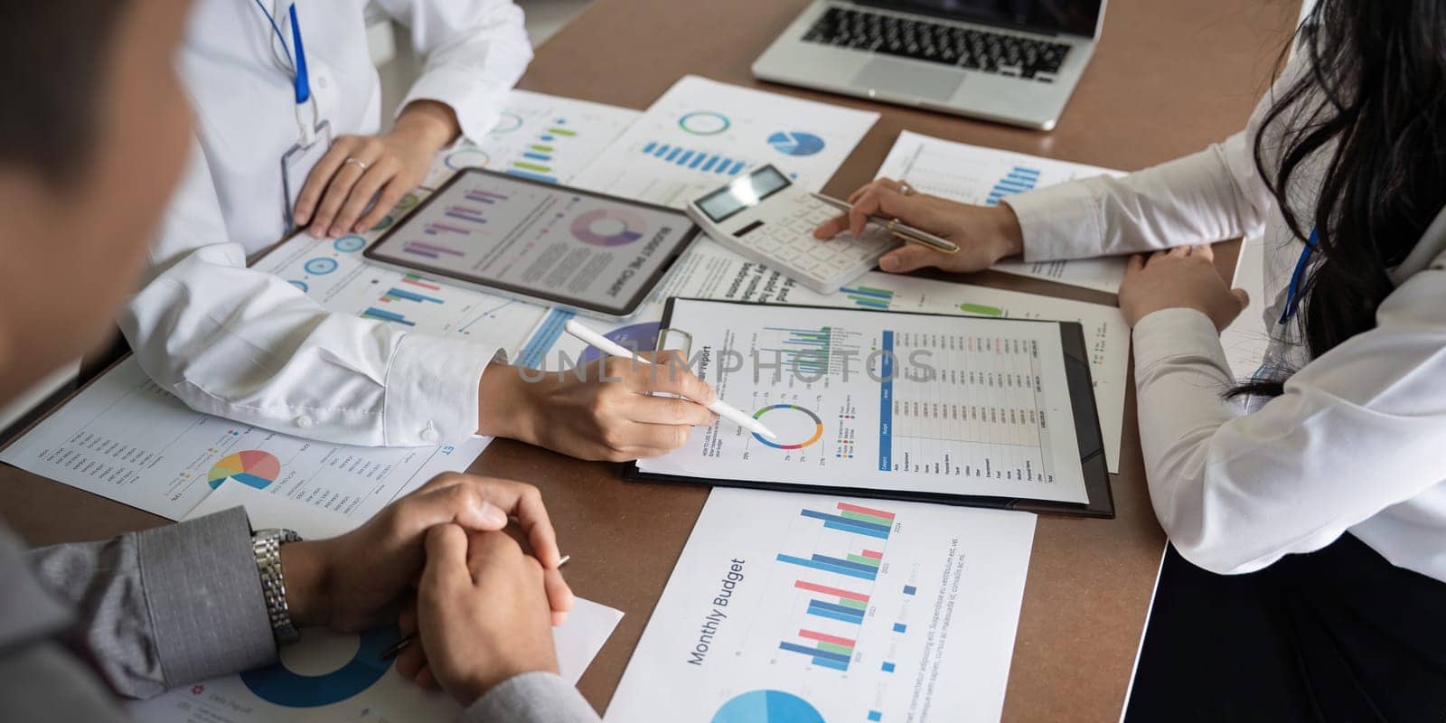 Business team employee adviser meeting to analysis and discuss the situation on the financial report in the meeting room. Investment Consultant, Financial advisor and accounting concept.