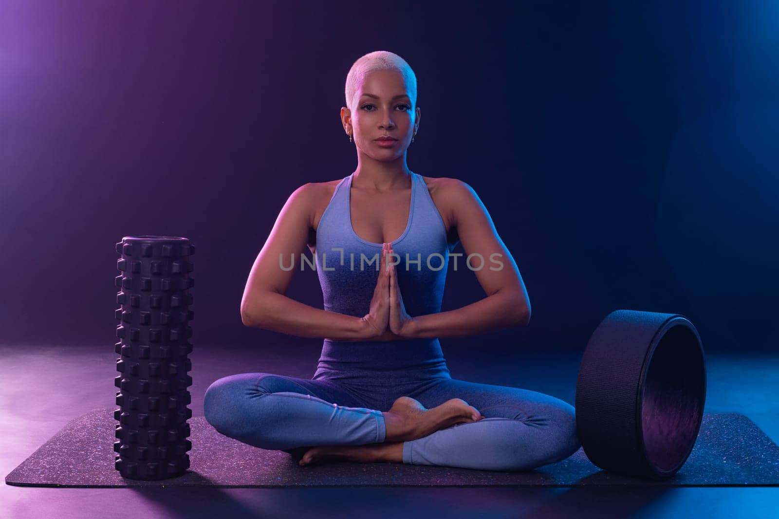 Download photo for yoga classes ads. Yoga asana Indoor. Sports recreation. Beautiful young woman in yoga pose. Individual sports.