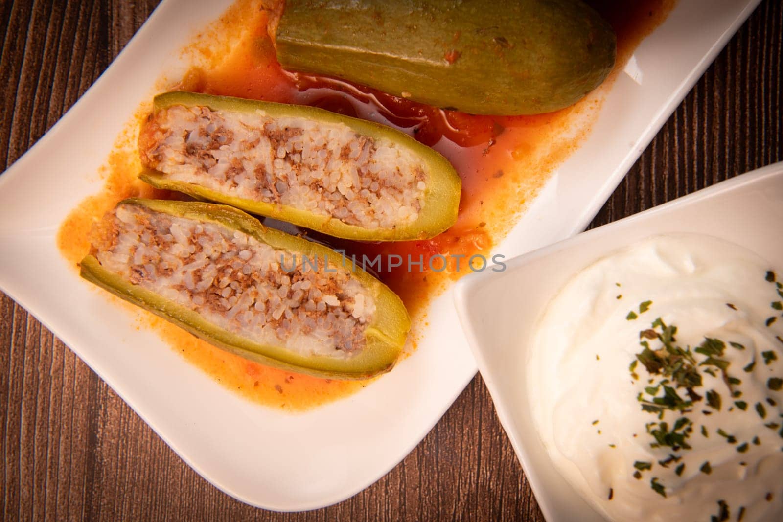 RECIPE FOR LEBANESE-STYLE MINI ZUCCHINI STUFFED WITH RICE AND BEEF IN A TOMATO SAUCE, High quality photo