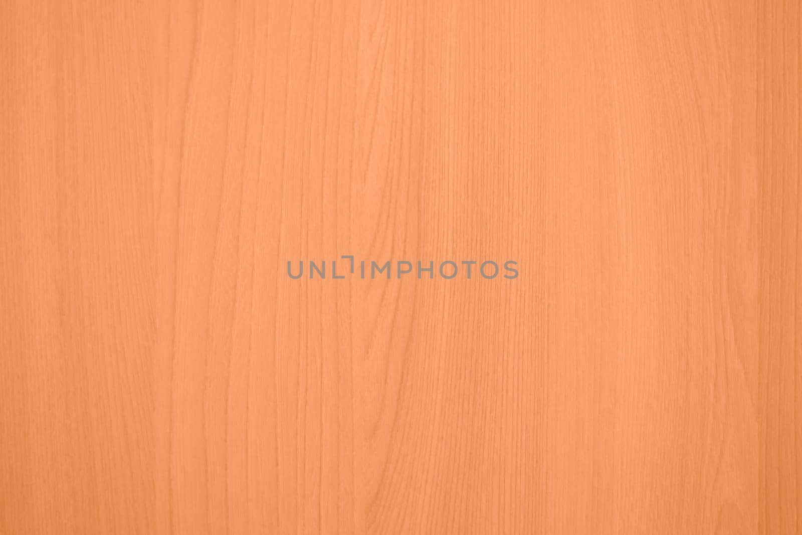 Peach Fuzz color wood texture monochrome background. Wood texture with natural pattern. Color of the year 2024. High quality photo