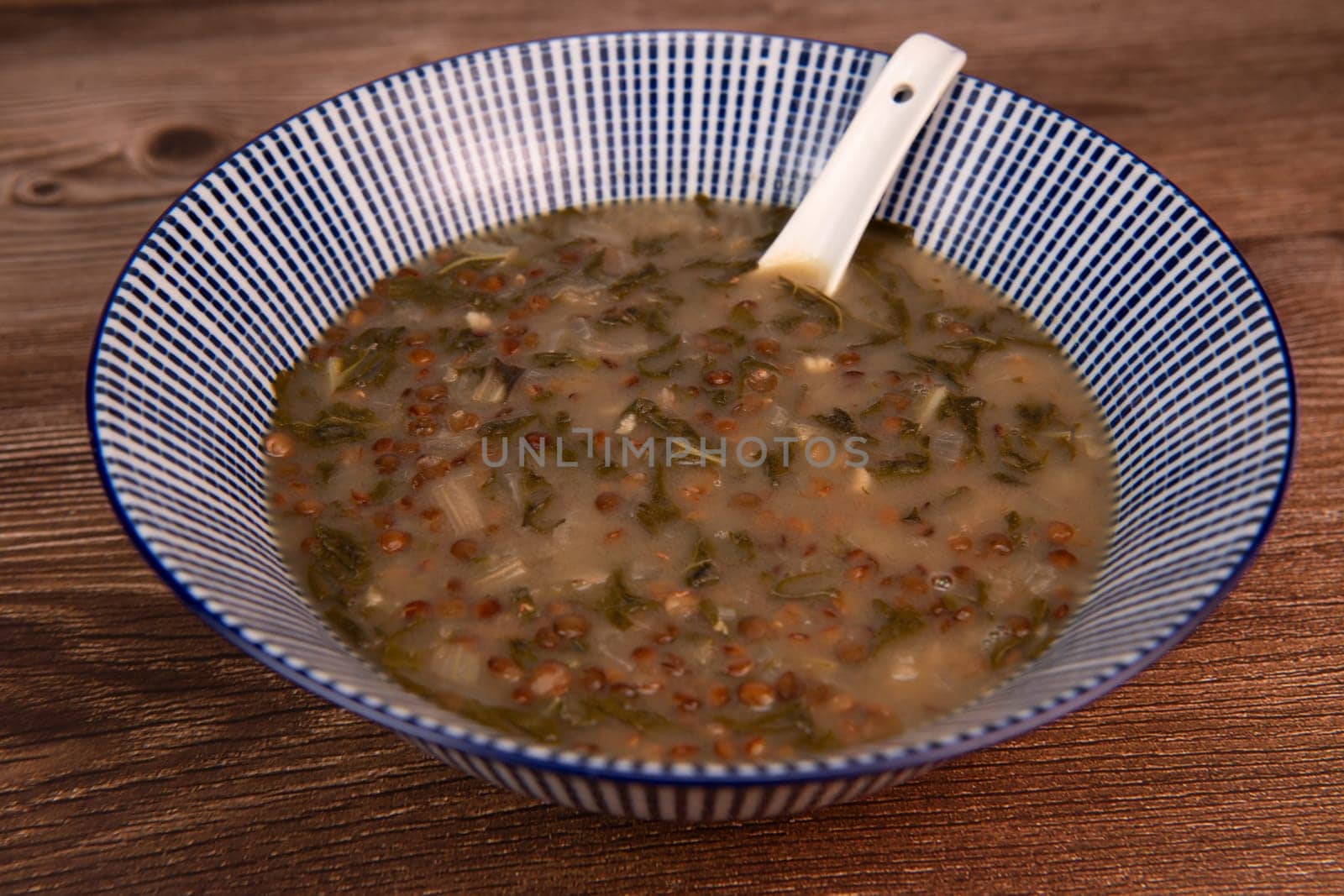 LEBANESE RECIPE FOR CHARD SOUP, LENTILS WITH LEMON, ADAS BI HAMOUD. High quality photo