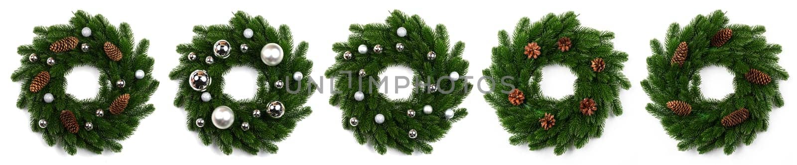 isolated christmas wreath and silver balls on white by Yellowj